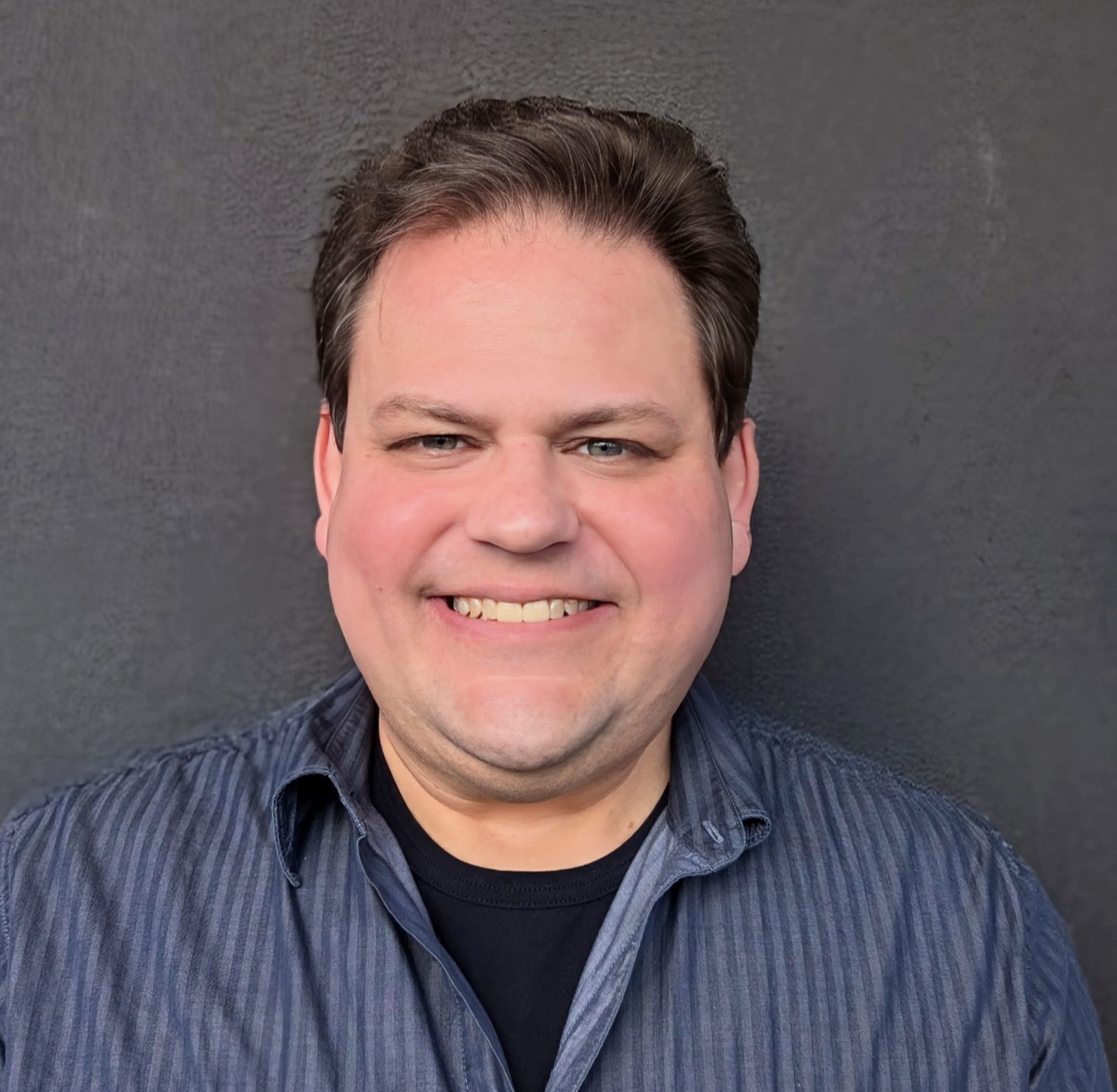 Professional headshot of Dan Phillips